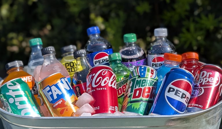 Pepsi and Coca Cola vending machines outside business